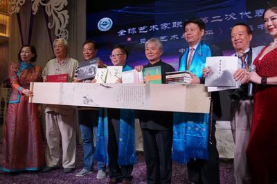 光影铸魂 隆回民俗摄影家老后喜获终身成就奖与国内文化艺术交流新展望